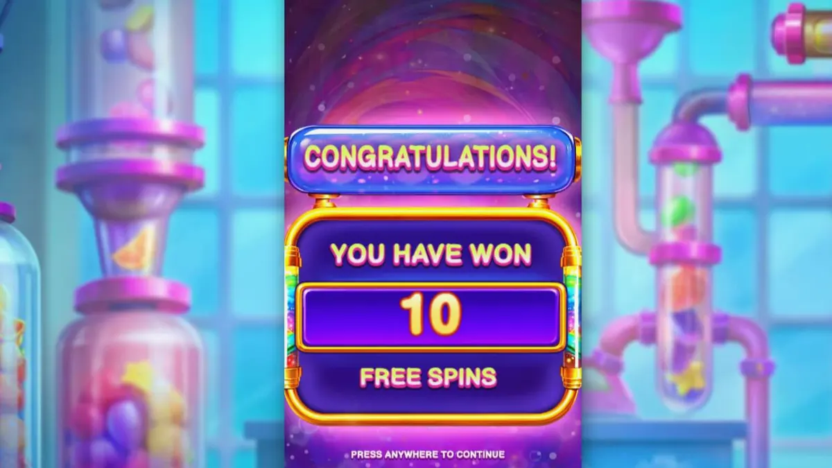 Interface de jogo do slot Sweet Burst com elementos de laboratório industrial e doces vibrantes